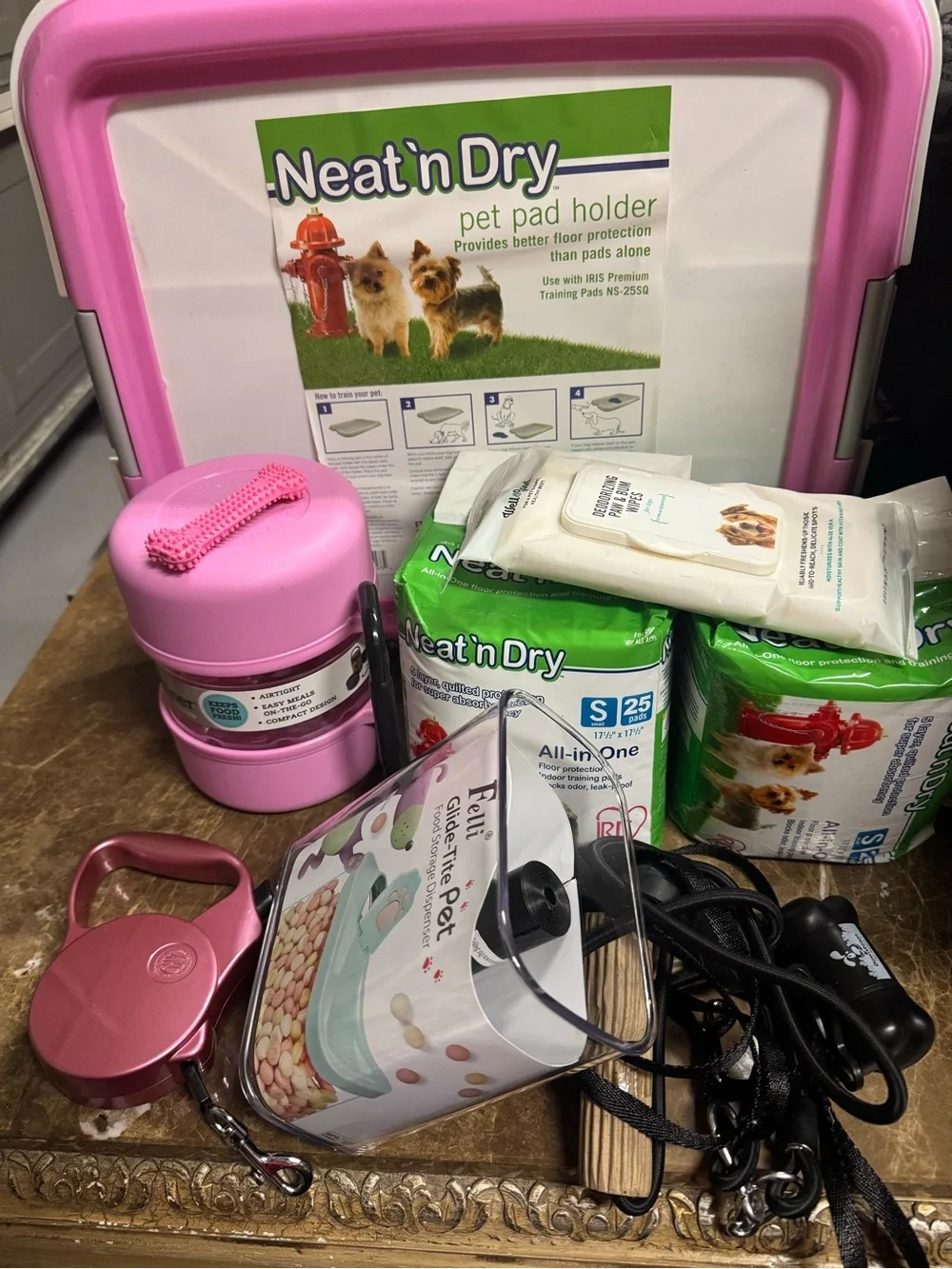 Lot of Pet accessories:Pad Holder,Leash,waste bags,retractabl leash,food storage
